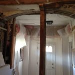The former doorway framing, we had to leave the post in place to support the archway