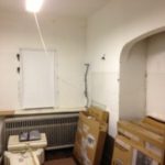 The interior of the enclosed porch. Note the 6' cast-iron radiator that would have heated the room, if it had worked